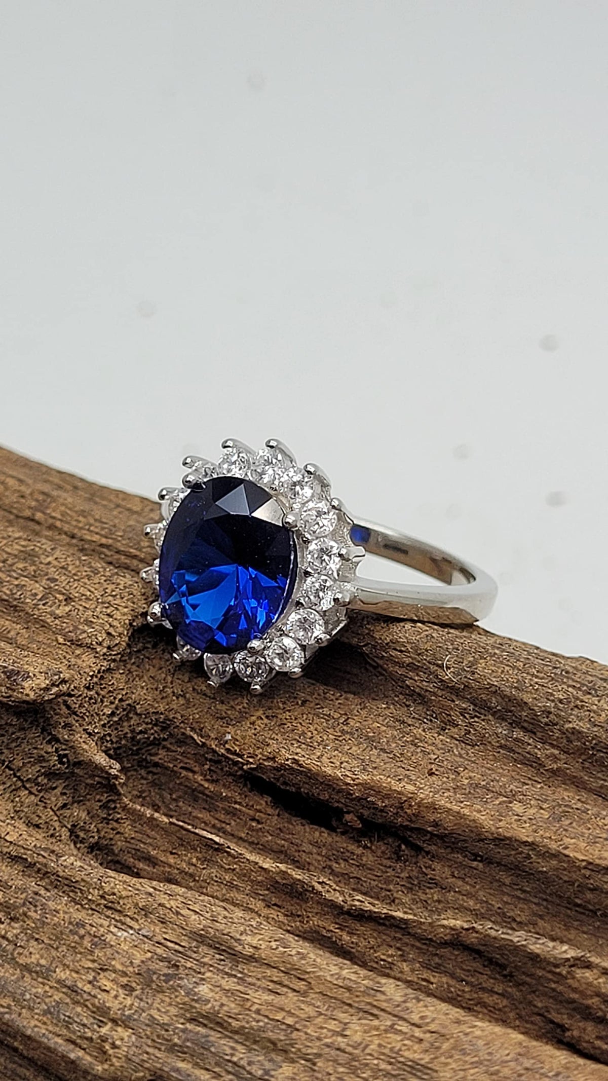 Womens Sterling Silver Blue Synthetic Sapphire & White Cubic Zirconia (CZ) Oval Cluster En 