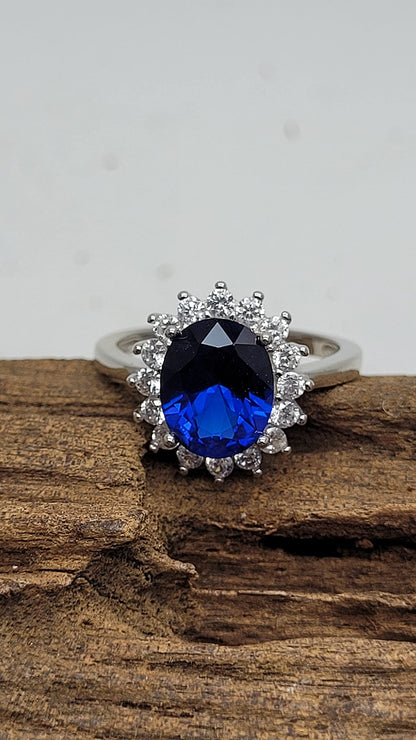 Womens Sterling Silver Blue Synthetic Sapphire & White Cubic Zirconia (CZ) Oval Cluster En 